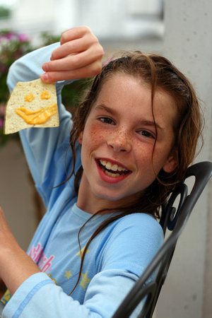 Katie enjoys a nacho...