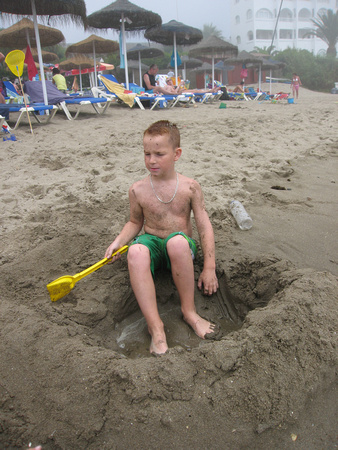 Andrew digging a hole to China